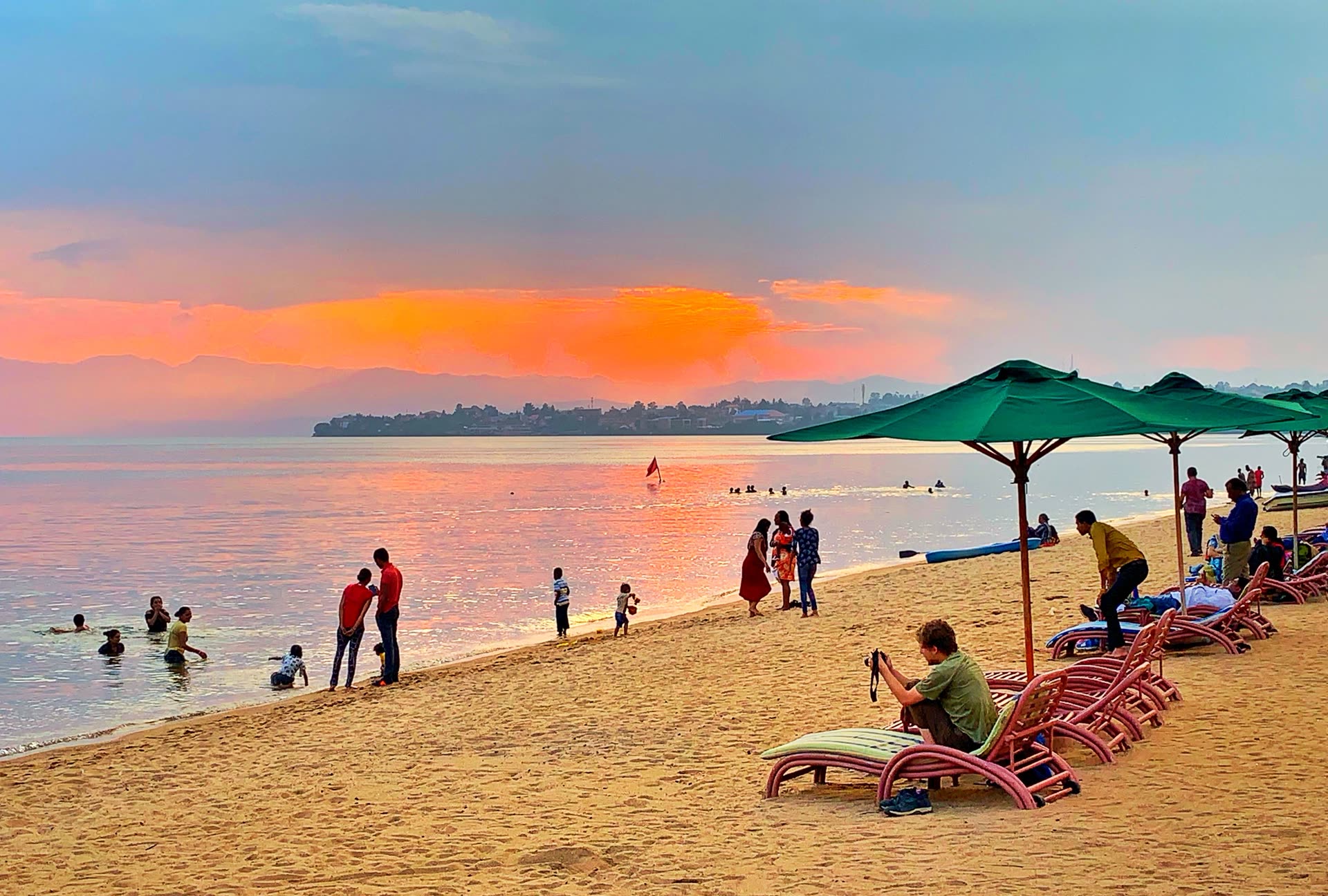 Lake Kivu shoreline at Gisenyi with palm-lined beach